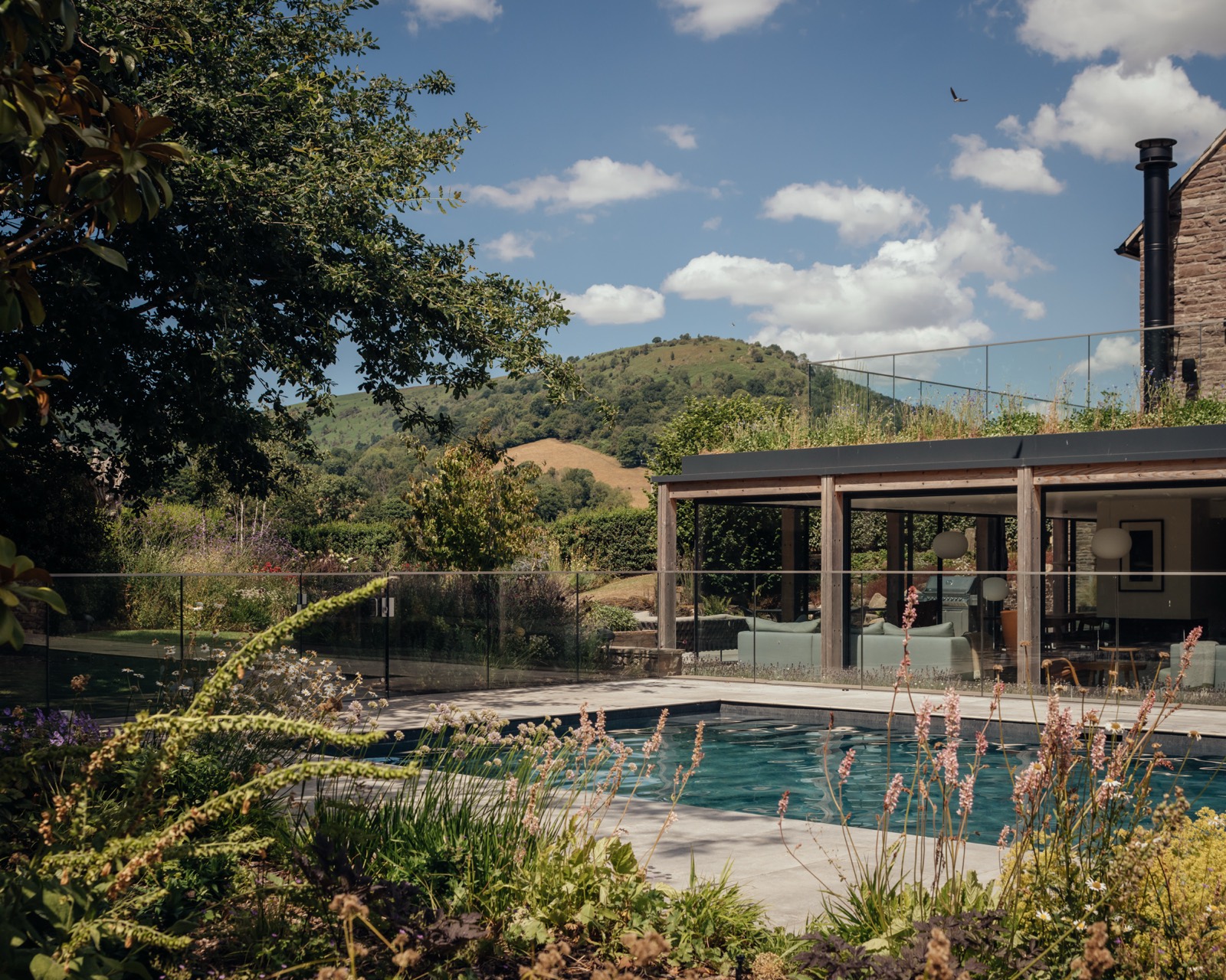 The pool and the extension across the garden