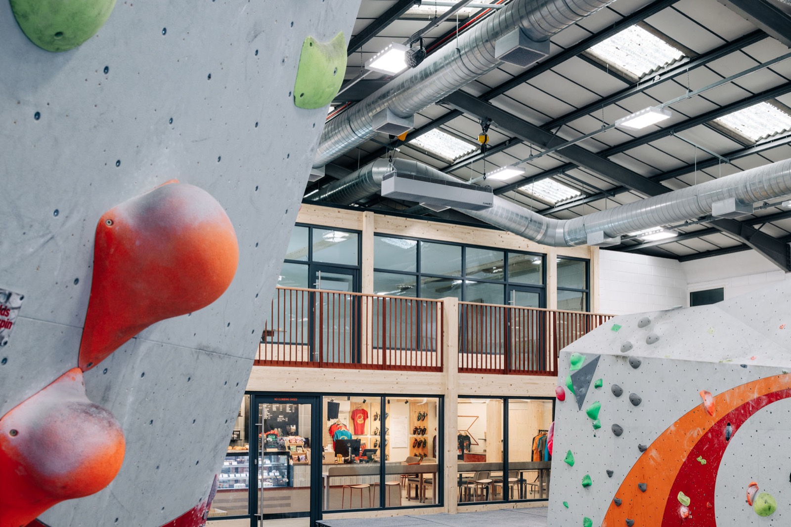 The bouldering walls with the cafe, shop and mezzanine beyond